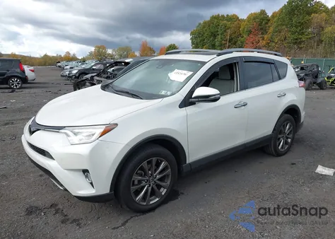 2018 Toyota Rav4 Limited z USA, uszkodzony, nr VIN JTMDFREV7JJ736678